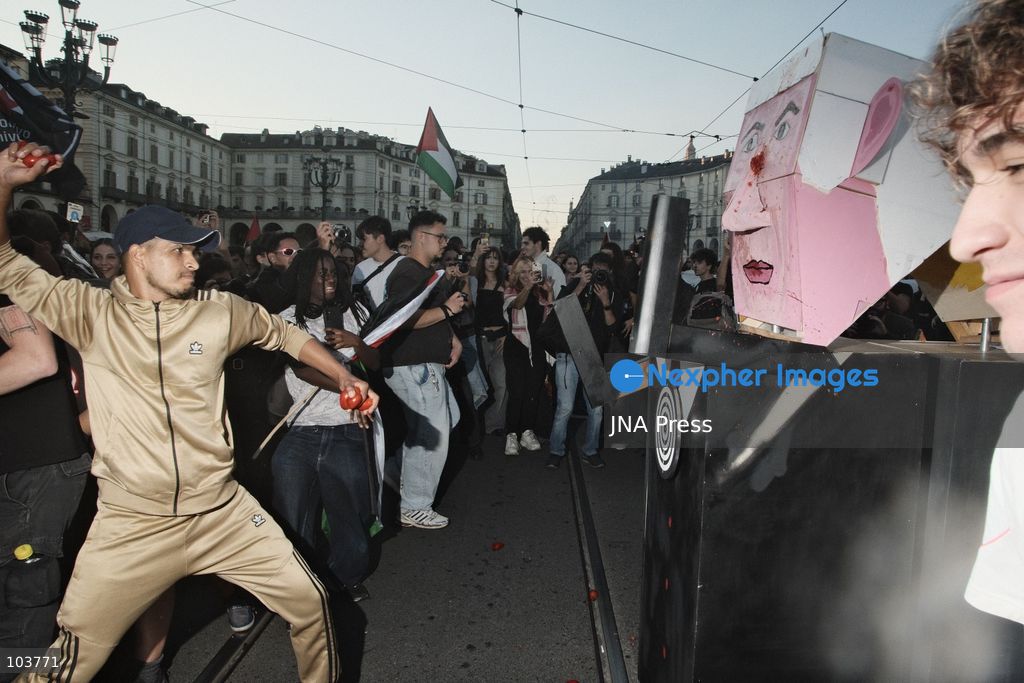 TURIN, ITALY, OCTOBER 10, 2026: Thousands of pro-Palestinian demonstrators march through Turin during a protest organized by the Torino per Gaza coalition. Tensions erupted near Piazza Castello when police blocked access to the square, leading to clashes between demonstrators and riot police before some protesters were allowed to enter. Participants carried Palestinian flags and displayed effigies of Israeli Prime Minister Benjamin Netanyahu and US President Donald Trump as they marched through the city in support of Palestine. Photo by Julian Nelaj / JNA Press. (Photo by Julian Nelaj/JNA Press via Nexpher Images)