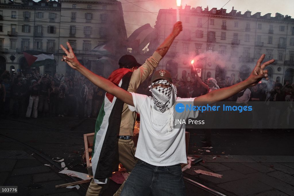TURIN, ITALY, OCTOBER 10, 2026: Thousands of pro-Palestinian demonstrators march through Turin during a protest organized by the Torino per Gaza coalition. Tensions erupted near Piazza Castello when police blocked access to the square, leading to clashes between demonstrators and riot police before some protesters were allowed to enter. Participants carried Palestinian flags and displayed effigies of Israeli Prime Minister Benjamin Netanyahu and US President Donald Trump as they marched through the city in support of Palestine. Photo by Julian Nelaj / JNA Press. (Photo by Julian Nelaj/JNA Press via Nexpher Images)