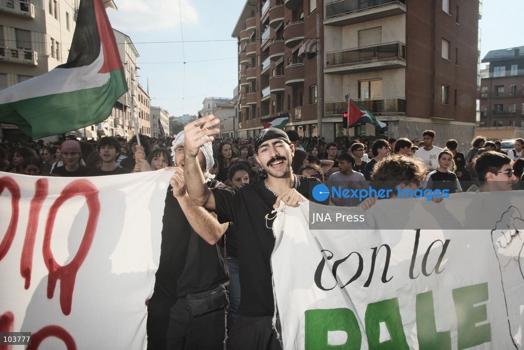 TURIN, ITALY, OCTOBER 10, 2026: Thousands of pro-Palestinian demonstrators march through Turin during a protest organized by the Torino per Gaza coalition. Tensions erupted near Piazza Castello when police blocked access to the square, leading to clashes between demonstrators and riot police before some protesters were allowed to enter. Participants carried Palestinian flags and displayed effigies of Israeli Prime Minister Benjamin Netanyahu and US President Donald Trump as they marched through the city in support of Palestine. Photo by Julian Nelaj / JNA Press. (Photo by Julian Nelaj/JNA Press via Nexpher Images)
