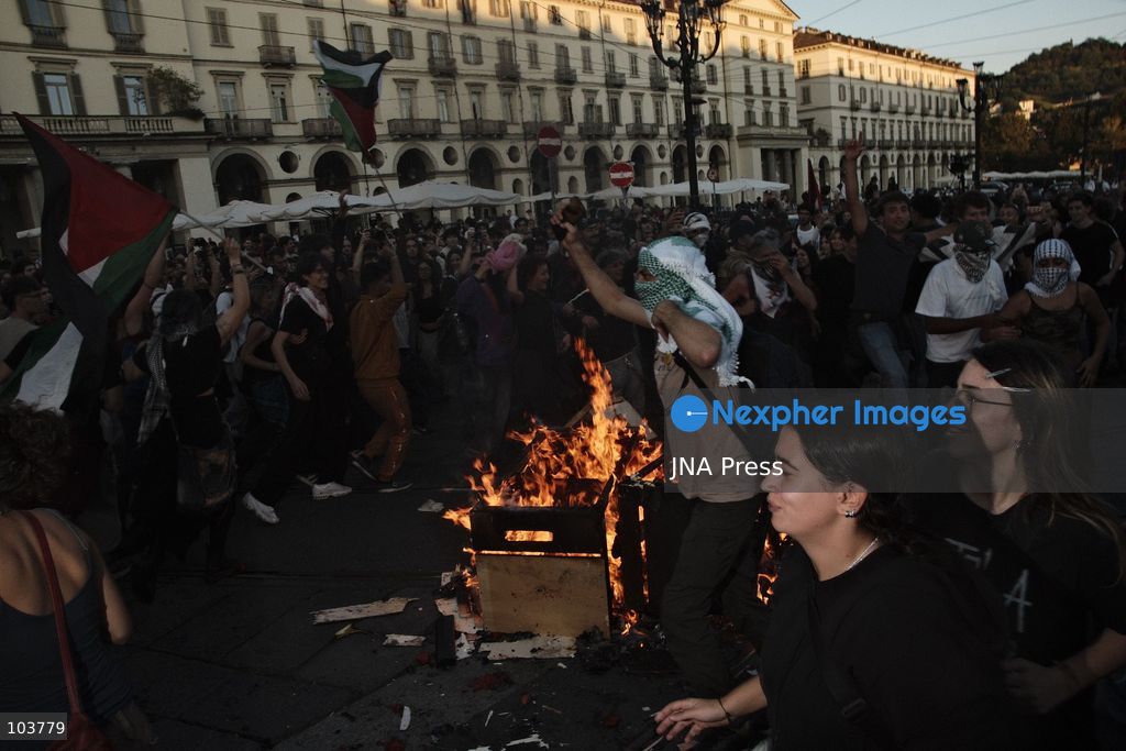 TURIN, ITALY, OCTOBER 10, 2026: Thousands of pro-Palestinian demonstrators march through Turin during a protest organized by the Torino per Gaza coalition. Tensions erupted near Piazza Castello when police blocked access to the square, leading to clashes between demonstrators and riot police before some protesters were allowed to enter. Participants carried Palestinian flags and displayed effigies of Israeli Prime Minister Benjamin Netanyahu and US President Donald Trump as they marched through the city in support of Palestine. Photo by Julian Nelaj / JNA Press. (Photo by Julian Nelaj/JNA Press via Nexpher Images)