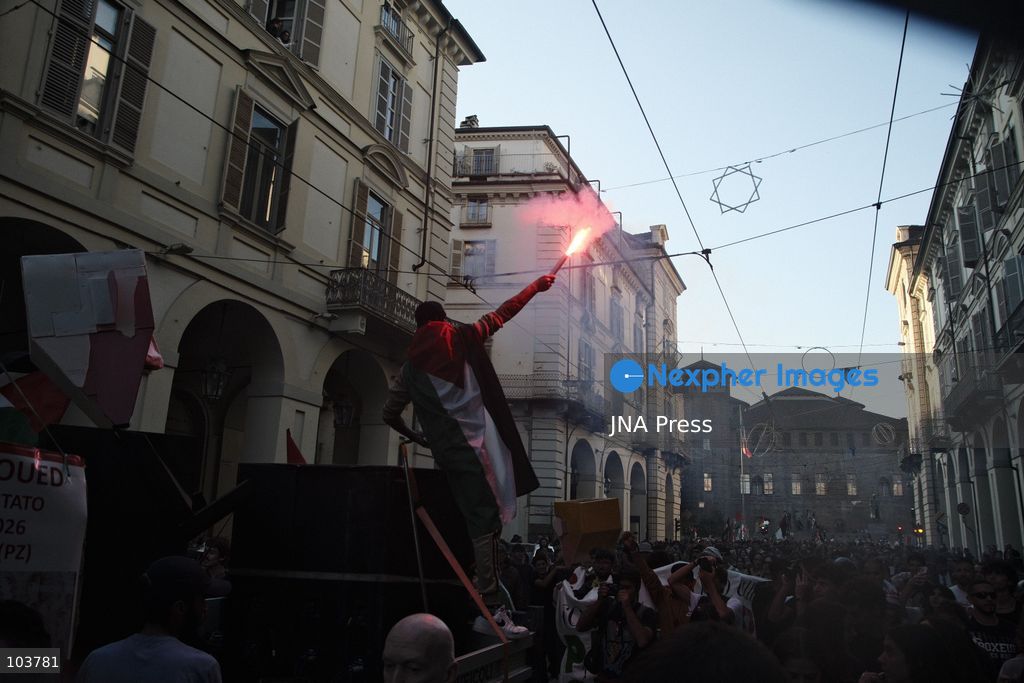 TURIN, ITALY, OCTOBER 10, 2026: Thousands of pro-Palestinian demonstrators march through Turin during a protest organized by the Torino per Gaza coalition. Tensions erupted near Piazza Castello when police blocked access to the square, leading to clashes between demonstrators and riot police before some protesters were allowed to enter. Participants carried Palestinian flags and displayed effigies of Israeli Prime Minister Benjamin Netanyahu and US President Donald Trump as they marched through the city in support of Palestine. Photo by Julian Nelaj / JNA Press. (Photo by Julian Nelaj/JNA Press via Nexpher Images)