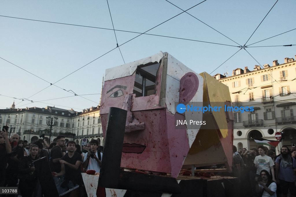 TURIN, ITALY, OCTOBER 10, 2026: Thousands of pro-Palestinian demonstrators march through Turin during a protest organized by the Torino per Gaza coalition. Tensions erupted near Piazza Castello when police blocked access to the square, leading to clashes between demonstrators and riot police before some protesters were allowed to enter. Participants carried Palestinian flags and displayed effigies of Israeli Prime Minister Benjamin Netanyahu and US President Donald Trump as they marched through the city in support of Palestine. Photo by Julian Nelaj / JNA Press. (Photo by Julian Nelaj/JNA Press via Nexpher Images)