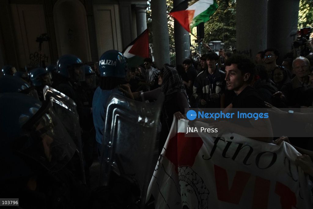 TURIN, ITALY, OCTOBER 10, 2026: Thousands of pro-Palestinian demonstrators march through Turin during a protest organized by the Torino per Gaza coalition. Tensions erupted near Piazza Castello when police blocked access to the square, leading to clashes between demonstrators and riot police before some protesters were allowed to enter. Participants carried Palestinian flags and displayed effigies of Israeli Prime Minister Benjamin Netanyahu and US President Donald Trump as they marched through the city in support of Palestine. Photo by Julian Nelaj / JNA Press. (Photo by Julian Nelaj/JNA Press via Nexpher Images)