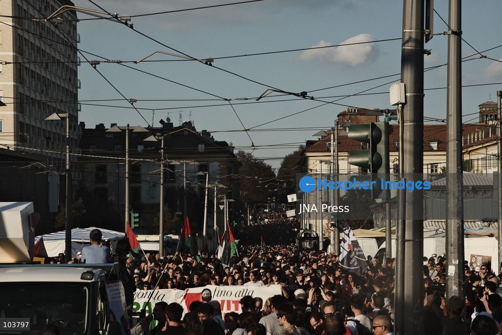 TURIN, ITALY, OCTOBER 10, 2026: Thousands of pro-Palestinian demonstrators march through Turin during a protest organized by the Torino per Gaza coalition. Tensions erupted near Piazza Castello when police blocked access to the square, leading to clashes between demonstrators and riot police before some protesters were allowed to enter. Participants carried Palestinian flags and displayed effigies of Israeli Prime Minister Benjamin Netanyahu and US President Donald Trump as they marched through the city in support of Palestine. Photo by Julian Nelaj / JNA Press. (Photo by Julian Nelaj/JNA Press via Nexpher Images)