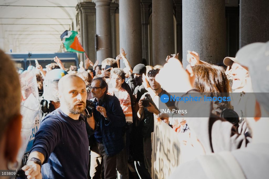 TURIN, ITALY, OCTOBER 10, 2026: Thousands of pro-Palestinian demonstrators march through central Turin during a regional protest organized by Torino per Gaza, as demonstrations take place across Italy in solidarity with Palestinians. Tensions erupted near Piazza Castello when protesters attempted to cross a police cordon, leading to brief confrontations before the march continued through the city. Demonstrators carried Palestinian flags and large effigies depicting US President Donald Trump and Israeli Prime Minister Benjamin Netanyahu. Toward the end of the demonstration, protesters threw tomatoes at the effigies before setting them on fire. Chiara Antenucci (Photo by Chiara Antenucci/JNA Press via Nexpher Images)