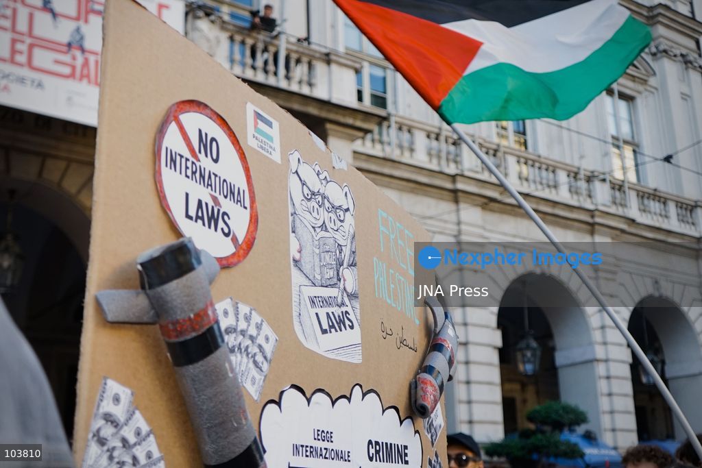 TURIN, ITALY, OCTOBER 10, 2026: Thousands of pro-Palestinian demonstrators march through central Turin during a regional protest organized by Torino per Gaza, as demonstrations take place across Italy in solidarity with Palestinians. Tensions erupted near Piazza Castello when protesters attempted to cross a police cordon, leading to brief confrontations before the march continued through the city. Demonstrators carried Palestinian flags and large effigies depicting US President Donald Trump and Israeli Prime Minister Benjamin Netanyahu. Toward the end of the demonstration, protesters threw tomatoes at the effigies before setting them on fire. Chiara Antenucci (Photo by Chiara Antenucci/JNA Press via Nexpher Images)