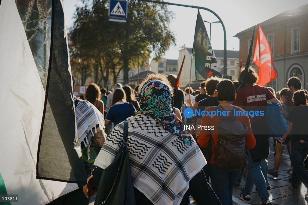 TURIN, ITALY, OCTOBER 10, 2026: Thousands of pro-Palestinian demonstrators march through central Turin during a regional protest organized by Torino per Gaza, as demonstrations take place across Italy in solidarity with Palestinians. Tensions erupted near Piazza Castello when protesters attempted to cross a police cordon, leading to brief confrontations before the march continued through the city. Demonstrators carried Palestinian flags and large effigies depicting US President Donald Trump and Israeli Prime Minister Benjamin Netanyahu. Toward the end of the demonstration, protesters threw tomatoes at the effigies before setting them on fire. Chiara Antenucci (Photo by Chiara Antenucci/JNA Press via Nexpher Images)
