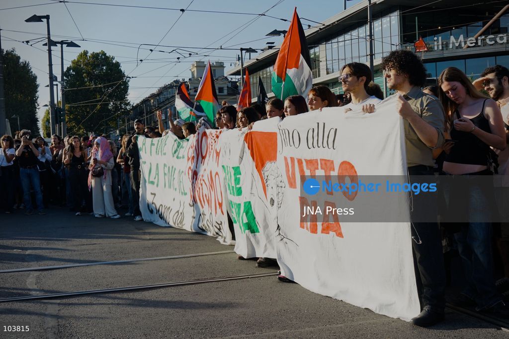TURIN, ITALY, OCTOBER 10, 2026: Thousands of pro-Palestinian demonstrators march through central Turin during a regional protest organized by Torino per Gaza, as demonstrations take place across Italy in solidarity with Palestinians. Tensions erupted near Piazza Castello when protesters attempted to cross a police cordon, leading to brief confrontations before the march continued through the city. Demonstrators carried Palestinian flags and large effigies depicting US President Donald Trump and Israeli Prime Minister Benjamin Netanyahu. Toward the end of the demonstration, protesters threw tomatoes at the effigies before setting them on fire. Chiara Antenucci (Photo by Chiara Antenucci/JNA Press via Nexpher Images)