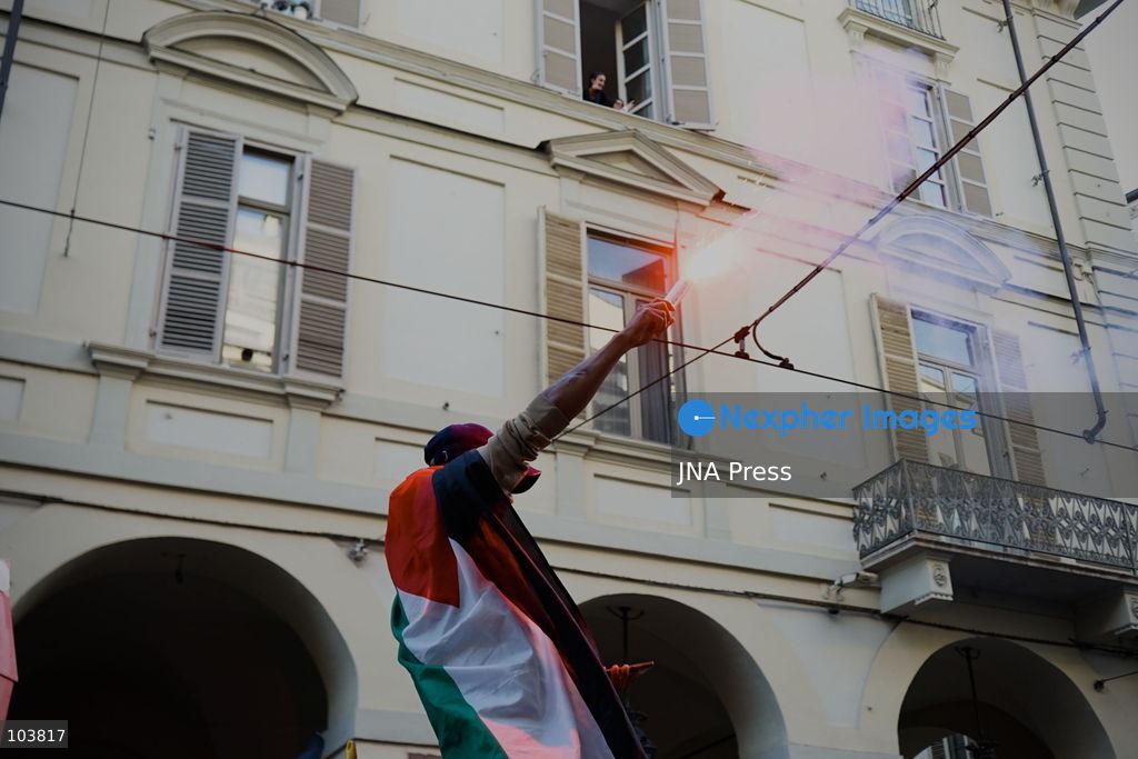 TURIN, ITALY, OCTOBER 10, 2026: Thousands of pro-Palestinian demonstrators march through central Turin during a regional protest organized by Torino per Gaza, as demonstrations take place across Italy in solidarity with Palestinians. Tensions erupted near Piazza Castello when protesters attempted to cross a police cordon, leading to brief confrontations before the march continued through the city. Demonstrators carried Palestinian flags and large effigies depicting US President Donald Trump and Israeli Prime Minister Benjamin Netanyahu. Toward the end of the demonstration, protesters threw tomatoes at the effigies before setting them on fire. Chiara Antenucci (Photo by Chiara Antenucci/JNA Press via Nexpher Images)