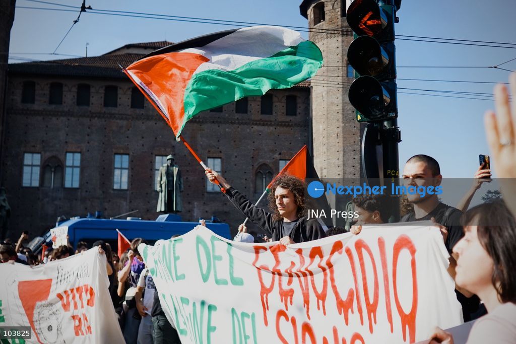 TURIN, ITALY, OCTOBER 10, 2026: Thousands of pro-Palestinian demonstrators march through central Turin during a regional protest organized by Torino per Gaza, as demonstrations take place across Italy in solidarity with Palestinians. Tensions erupted near Piazza Castello when protesters attempted to cross a police cordon, leading to brief confrontations before the march continued through the city. Demonstrators carried Palestinian flags and large effigies depicting US President Donald Trump and Israeli Prime Minister Benjamin Netanyahu. Toward the end of the demonstration, protesters threw tomatoes at the effigies before setting them on fire. Chiara Antenucci (Photo by Chiara Antenucci/JNA Press via Nexpher Images)