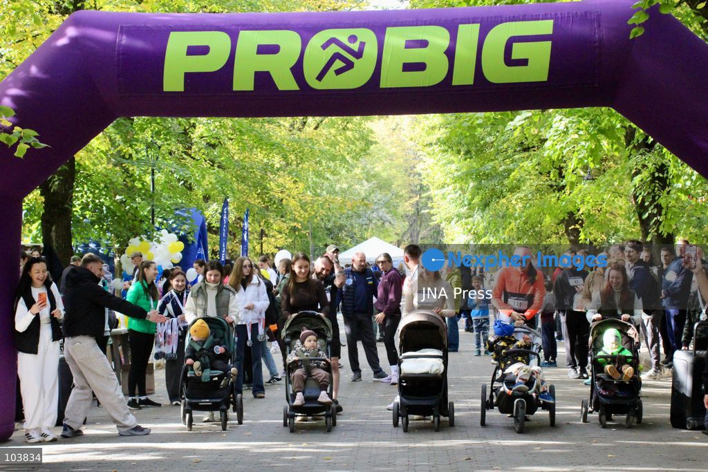 LVIV, UKRAINE, OCTOBER 10, 2026: Around 200 participants take part in the PROBIG | SviTY Run charity event in Lviv to raise funds for children and adolescents affected by the war in Ukraine. Organized by Kids of Ukraine in collaboration with PROBIG and event partners, the fundraiser featured 2.5-kilometer and 5-kilometer races, a children's race and a special race for mothers. Proceeds will support the SviTY program, which operates four psychosocial support centers in Lviv, Khmelnytskyi, Cherkasy and Zhytomyr, providing psychological assistance, social integration activities and educational guidance to adolescents affected by the war. Photo by Catherine Manso / JNA Press. (Photo by Catherine Manso/JNA Press via Nexpher Images)
