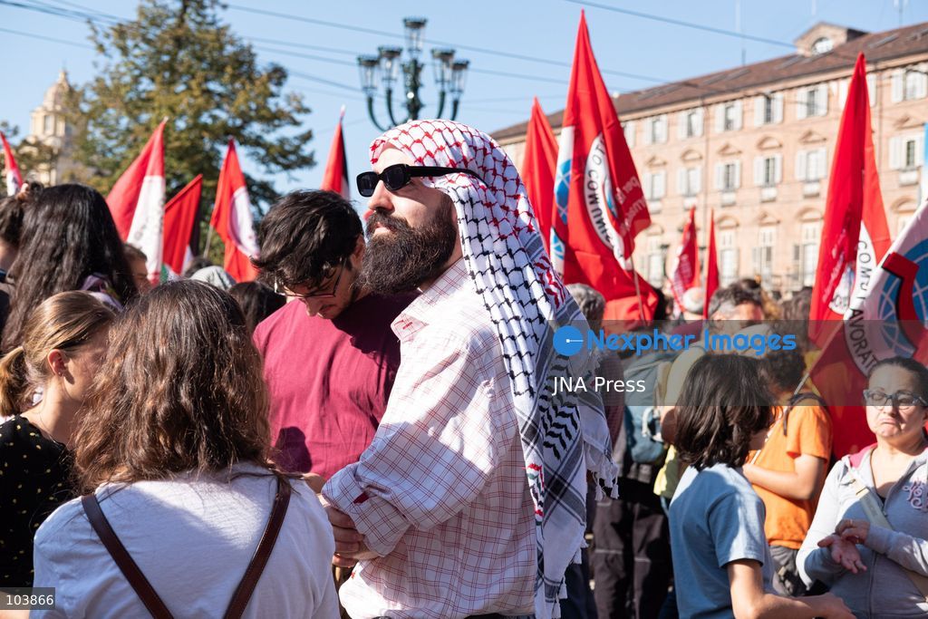 TURIN, ITALY, OCTOBER 10, 2026: Thousands of demonstrators march through the streets of Turin during a regional protest in solidarity with Palestine. Participants from across the Piedmont region gathered for the demonstration organized by Torino per Gaza, waving Palestinian flags and carrying banners as they marched through the city center. The procession passed through several neighborhoods, including Barriera di Milano, before returning toward central Turin. Italian news agency ANSA estimated attendance at around 8,000, while organizers claimed 20,000 participants. Photo by Camilla Baronetto / JNA Press. (Photo by Camilla Baronetto/JNA Press via Nexpher Images)