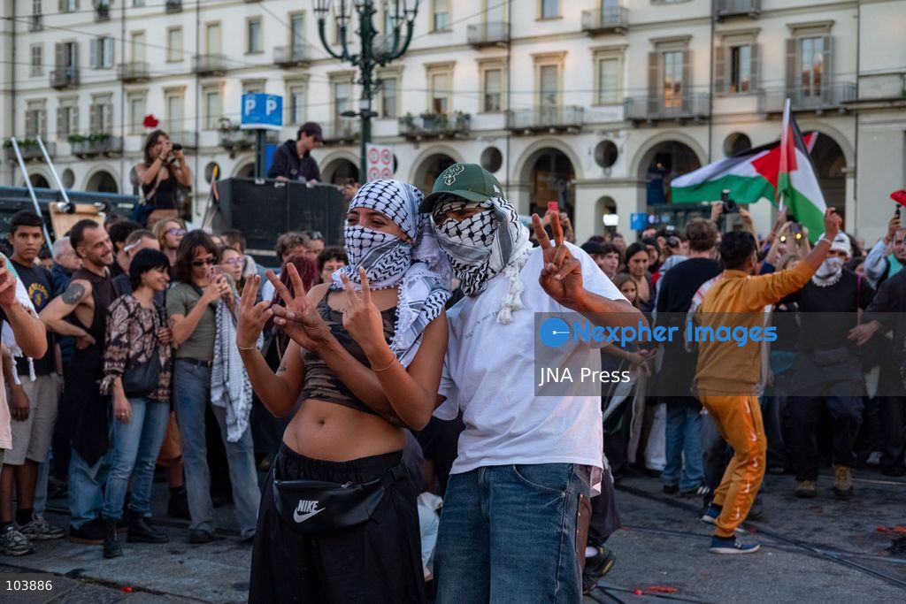 TURIN, ITALY, OCTOBER 10, 2026: Thousands of demonstrators march through the streets of Turin during a regional protest in solidarity with Palestine. Participants from across the Piedmont region gathered for the demonstration organized by Torino per Gaza, waving Palestinian flags and carrying banners as they marched through the city center. The procession passed through several neighborhoods, including Barriera di Milano, before returning toward central Turin. Italian news agency ANSA estimated attendance at around 8,000, while organizers claimed 20,000 participants. Photo by Camilla Baronetto / JNA Press. (Photo by Camilla Baronetto/JNA Press via Nexpher Images)