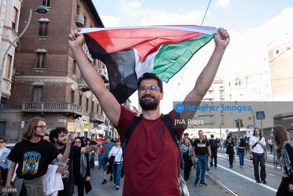 TURIN, ITALY, OCTOBER 10, 2026: Thousands of demonstrators march through the streets of Turin during a regional protest in solidarity with Palestine. Participants from across the Piedmont region gathered for the demonstration organized by Torino per Gaza, waving Palestinian flags and carrying banners as they marched through the city center. The procession passed through several neighborhoods, including Barriera di Milano, before returning toward central Turin. Italian news agency ANSA estimated attendance at around 8,000, while organizers claimed 20,000 participants. Photo by Camilla Baronetto / JNA Press. (Photo by Camilla Baronetto/JNA Press via Nexpher Images)