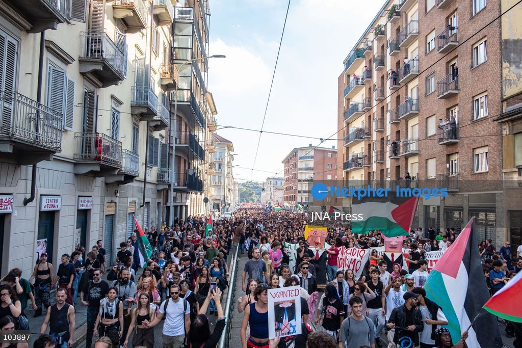 TURIN, ITALY, OCTOBER 10, 2026: Thousands of demonstrators march through the streets of Turin during a regional protest in solidarity with Palestine. Participants from across the Piedmont region gathered for the demonstration organized by Torino per Gaza, waving Palestinian flags and carrying banners as they marched through the city center. The procession passed through several neighborhoods, including Barriera di Milano, before returning toward central Turin. Italian news agency ANSA estimated attendance at around 8,000, while organizers claimed 20,000 participants. Photo by Camilla Baronetto / JNA Press. (Photo by Camilla Baronetto/JNA Press via Nexpher Images)