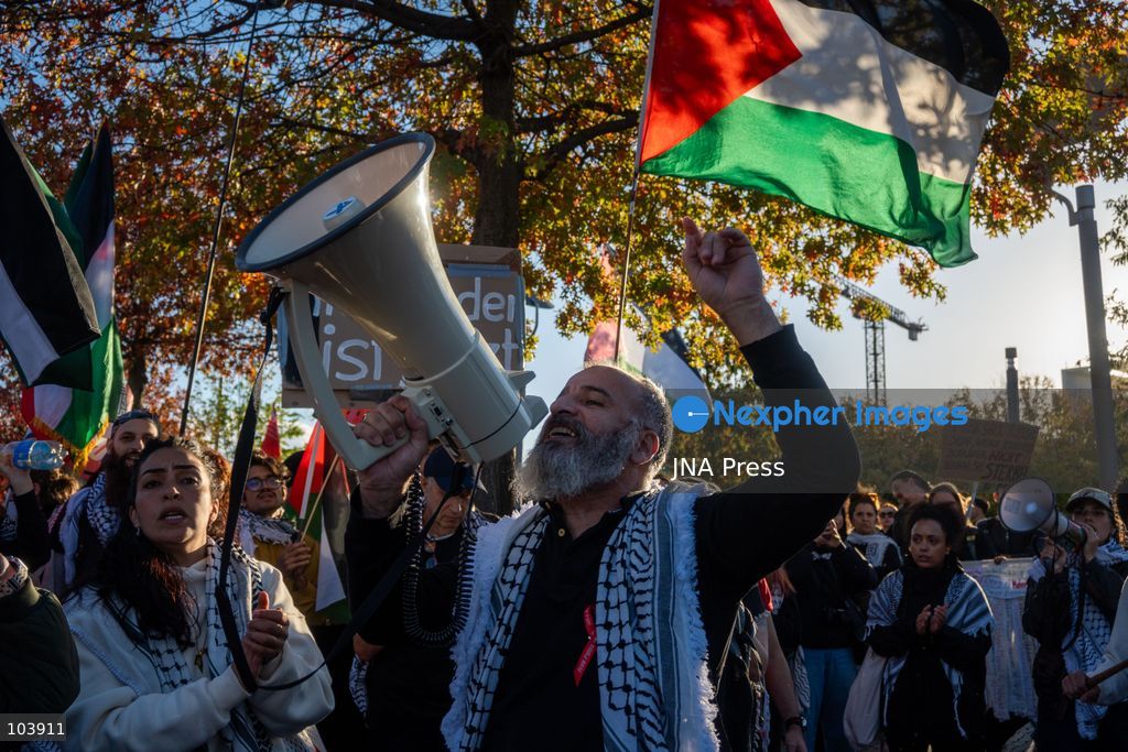 BERLIN, GERMANY, OCTOBER 10, 2026: Thousands of pro-Palestinian demonstrators march through central Berlin during the United4Palestine rally under the slogan "No Peace on Stolen Land." Protesters called for an end to the Israeli occupation of Palestinian territories and demanded that Germany end its political and military support for Israel. Organizers estimated attendance at 20,000 people, while Berlin police reported approximately 3,500 participants. Smaller pro-Israel counter-demonstrations were also held in the German capital amid a significant police presence. Photo by Jess Flom / JNA Press. (Photo by jess flom/JNA Press via Nexpher Images)