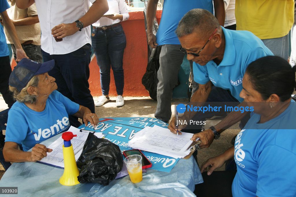 SAN FRANCISCO, ZULIA, VENEZUELA, OCTOBER 10, 2026: Members and supporters of the opposition party Vente Venezuela, led by Maria Corina Machado, take part in a membership registration campaign in San Francisco municipality, Zulia state. The initiative, called "Vente Toma el Zulia," aims to recruit new party members and strengthen the organization's presence across the state ahead of possible presidential elections in 2027. Party organizers said the campaign would take place across 109 parishes in Zulia. Photo by Humberto Matheus / JNA Press. (Photo by Humberto Matheus/JNA Press via Nexpher Images)