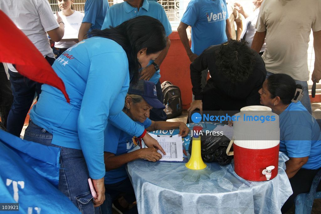 SAN FRANCISCO, ZULIA, VENEZUELA, OCTOBER 10, 2026: Members and supporters of the opposition party Vente Venezuela, led by Maria Corina Machado, take part in a membership registration campaign in San Francisco municipality, Zulia state. The initiative, called "Vente Toma el Zulia," aims to recruit new party members and strengthen the organization's presence across the state ahead of possible presidential elections in 2027. Party organizers said the campaign would take place across 109 parishes in Zulia. Photo by Humberto Matheus / JNA Press. (Photo by Humberto Matheus/JNA Press via Nexpher Images)