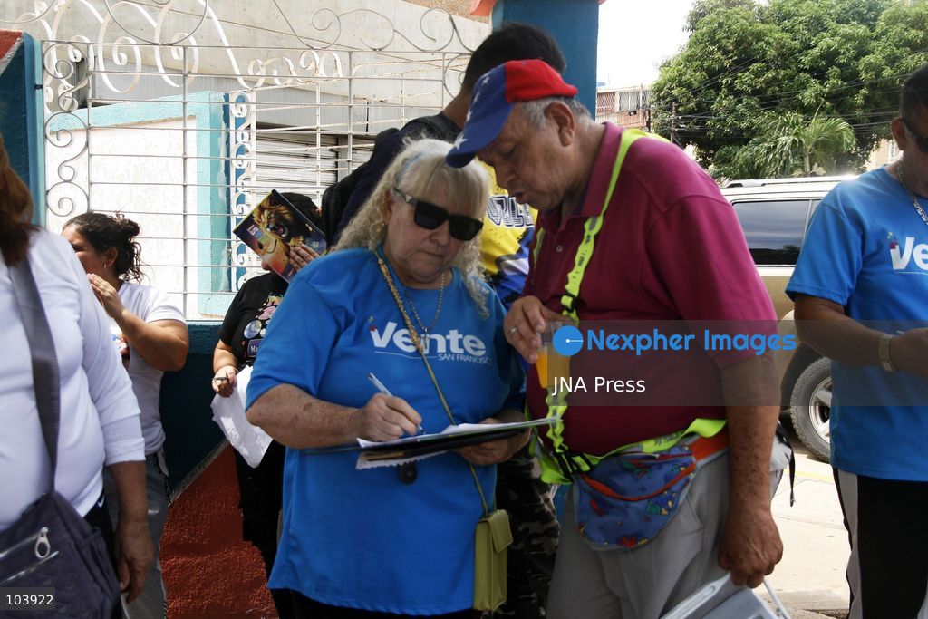 SAN FRANCISCO, ZULIA, VENEZUELA, OCTOBER 10, 2026: Members and supporters of the opposition party Vente Venezuela, led by Maria Corina Machado, take part in a membership registration campaign in San Francisco municipality, Zulia state. The initiative, called "Vente Toma el Zulia," aims to recruit new party members and strengthen the organization's presence across the state ahead of possible presidential elections in 2027. Party organizers said the campaign would take place across 109 parishes in Zulia. Photo by Humberto Matheus / JNA Press. (Photo by Humberto Matheus/JNA Press via Nexpher Images)
