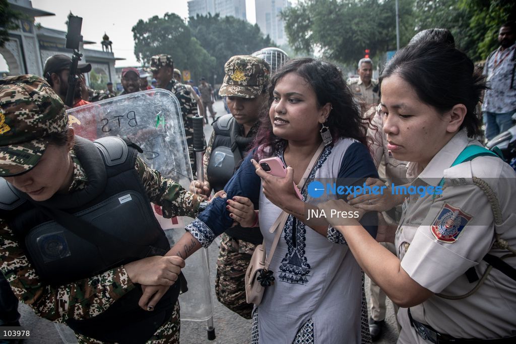 NEW DELHI, INDIA, OCTOBER 10, 2026: Police officers detain a protester during demonstrations organized by the Cockroach Janta Party (CJP) demanding the resignation of India's Chief Election Commissioner Gyanesh Kumar over alleged irregularities in electoral roll revisions. Indian authorities deployed thousands of security personnel and imposed restrictions across New Delhi to prevent protesters from gathering at Jantar Mantar. Thousands of demonstrators and activists were detained during the police operation. Photo by Amit Shukla / JNA Press. (Photo by Amit shukla/JNA Press via Nexpher Images)