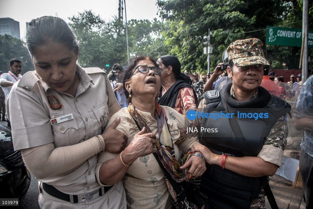 NEW DELHI, INDIA, OCTOBER 10, 2026: Police officers detain a protester during demonstrations organized by the Cockroach Janta Party (CJP) demanding the resignation of India's Chief Election Commissioner Gyanesh Kumar over alleged irregularities in electoral roll revisions. Indian authorities deployed thousands of security personnel and imposed restrictions across New Delhi to prevent protesters from gathering at Jantar Mantar. Thousands of demonstrators and activists were detained during the police operation. Photo by Amit Shukla / JNA Press. (Photo by Amit shukla/JNA Press via Nexpher Images)