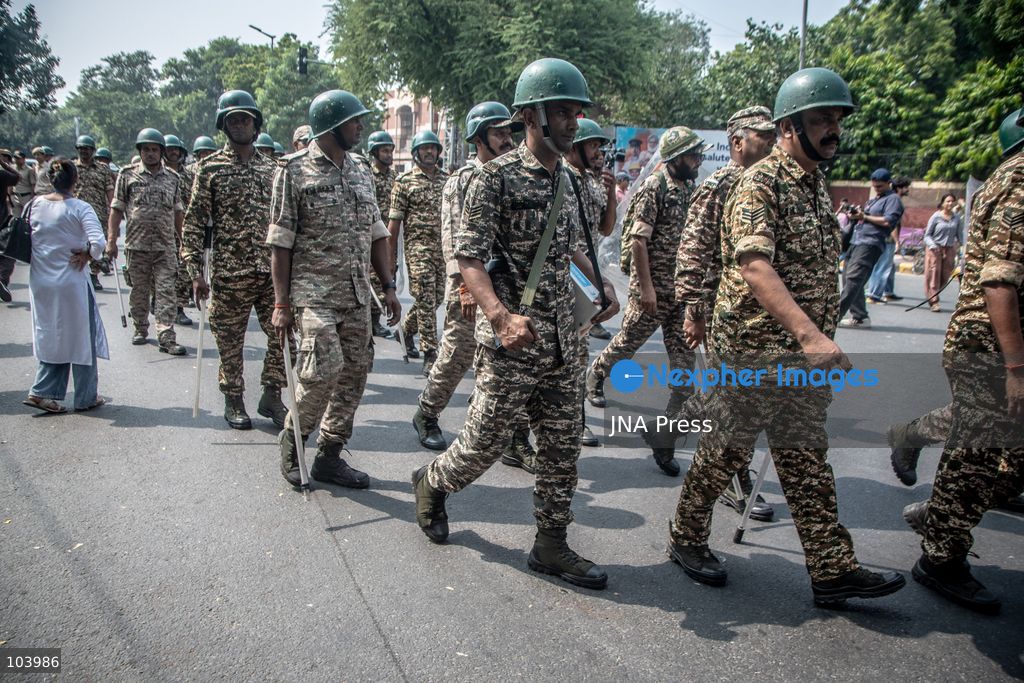 NEW DELHI, INDIA, OCTOBER 10, 2026: Police officers detain a protester during demonstrations organized by the Cockroach Janta Party (CJP) demanding the resignation of India's Chief Election Commissioner Gyanesh Kumar over alleged irregularities in electoral roll revisions. Indian authorities deployed thousands of security personnel and imposed restrictions across New Delhi to prevent protesters from gathering at Jantar Mantar. Thousands of demonstrators and activists were detained during the police operation. Photo by Amit Shukla / JNA Press. (Photo by Amit shukla/JNA Press via Nexpher Images)