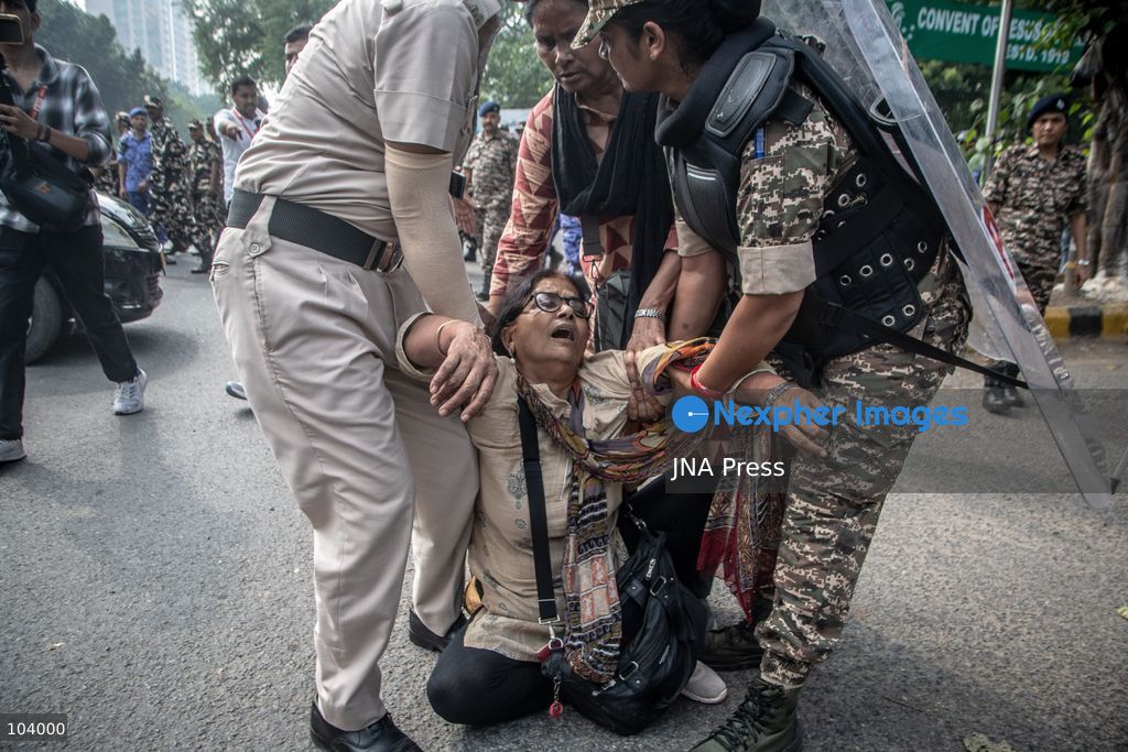 NEW DELHI, INDIA, OCTOBER 10, 2026: Police officers detain a protester during demonstrations organized by the Cockroach Janta Party (CJP) demanding the resignation of India's Chief Election Commissioner Gyanesh Kumar over alleged irregularities in electoral roll revisions. Indian authorities deployed thousands of security personnel and imposed restrictions across New Delhi to prevent protesters from gathering at Jantar Mantar. Thousands of demonstrators and activists were detained during the police operation. Photo by Amit Shukla / JNA Press. (Photo by Amit shukla/JNA Press via Nexpher Images)