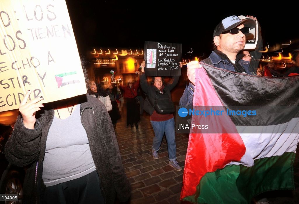 CUSCO, PERU, OCTOBER 11, 2026 : Around 40 protesters, including local residents and foreign nationals, march through the historic center of Cusco as part of the Global Action for Palestine, a coordinated international day of demonstrations. Participants called on the Peruvian government to sever diplomatic relations and military-related ties with Israel. Demonstrators also urged regional authorities to address concerns over the presence of Israeli soldiers visiting Cusco and surrounding areas, while expressing solidarity with Palestinians amid Israel's military operations. Photo by Erick Diaz/ JNA Press. (Photo by Erick Diaz Veliz/JNA Press via Nexpher Images)
