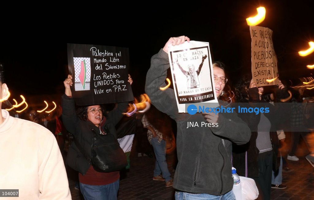CUSCO, PERU, OCTOBER 11, 2026 : Around 40 protesters, including local residents and foreign nationals, march through the historic center of Cusco as part of the Global Action for Palestine, a coordinated international day of demonstrations. Participants called on the Peruvian government to sever diplomatic relations and military-related ties with Israel. Demonstrators also urged regional authorities to address concerns over the presence of Israeli soldiers visiting Cusco and surrounding areas, while expressing solidarity with Palestinians amid Israel's military operations. Photo by Erick Diaz/ JNA Press. (Photo by Erick Diaz Veliz/JNA Press via Nexpher Images)