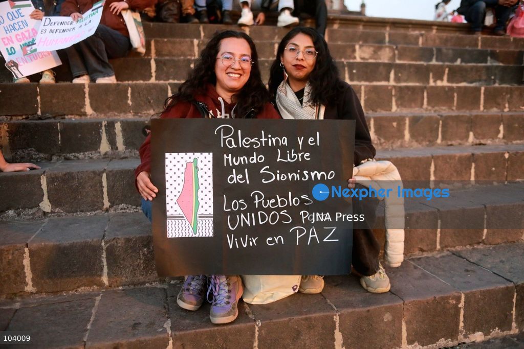 CUSCO, PERU, OCTOBER 11, 2026 : Around 40 protesters, including local residents and foreign nationals, march through the historic center of Cusco as part of the Global Action for Palestine, a coordinated international day of demonstrations. Participants called on the Peruvian government to sever diplomatic relations and military-related ties with Israel. Demonstrators also urged regional authorities to address concerns over the presence of Israeli soldiers visiting Cusco and surrounding areas, while expressing solidarity with Palestinians amid Israel's military operations. Photo by Erick Diaz/ JNA Press. (Photo by Erick Diaz Veliz/JNA Press via Nexpher Images)