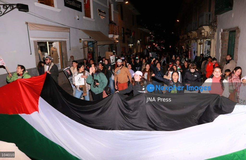 CUSCO, PERU, OCTOBER 11, 2026 : Around 40 protesters, including local residents and foreign nationals, march through the historic center of Cusco as part of the Global Action for Palestine, a coordinated international day of demonstrations. Participants called on the Peruvian government to sever diplomatic relations and military-related ties with Israel. Demonstrators also urged regional authorities to address concerns over the presence of Israeli soldiers visiting Cusco and surrounding areas, while expressing solidarity with Palestinians amid Israel's military operations. Photo by Erick Diaz/ JNA Press. (Photo by Erick Diaz Veliz/JNA Press via Nexpher Images)