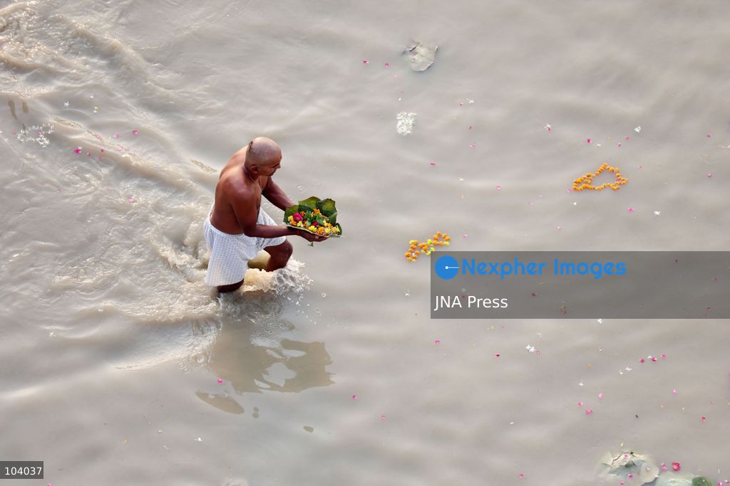 PRAYAGRAJ, INDIA, OCTOBER 11, 2026: Hindu devotees take a holy dip in the Ganga River at Phaphamau in Prayagraj, Uttar Pradesh, on the first day of the nine-day Navratri festival. The religious festival is dedicated to the worship of the Hindu goddess Durga and her nine forms, with devotees observing prayers, fasting and traditional rituals throughout the celebrations. Photo by Jitendra Prakash / JNA Press. (Photo by Jitendra Prakash/JNA Press via Nexpher Images)