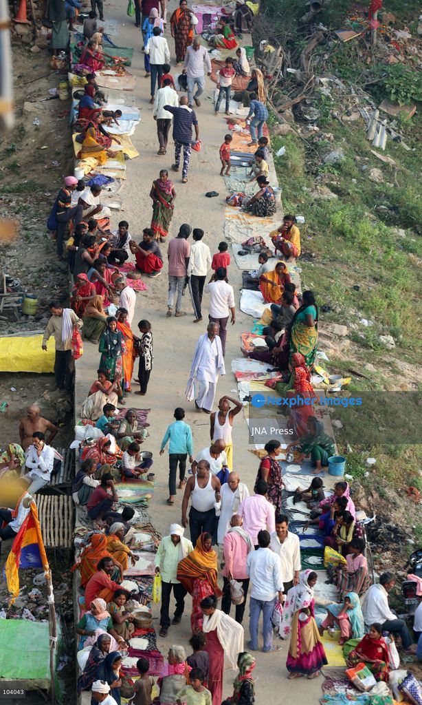 PRAYAGRAJ, INDIA, OCTOBER 11, 2026: Hindu devotees take a holy dip in the Ganga River at Phaphamau in Prayagraj, Uttar Pradesh, on the first day of the nine-day Navratri festival. The religious festival is dedicated to the worship of the Hindu goddess Durga and her nine forms, with devotees observing prayers, fasting and traditional rituals throughout the celebrations. Photo by Jitendra Prakash / JNA Press. (Photo by Jitendra Prakash/JNA Press via Nexpher Images)