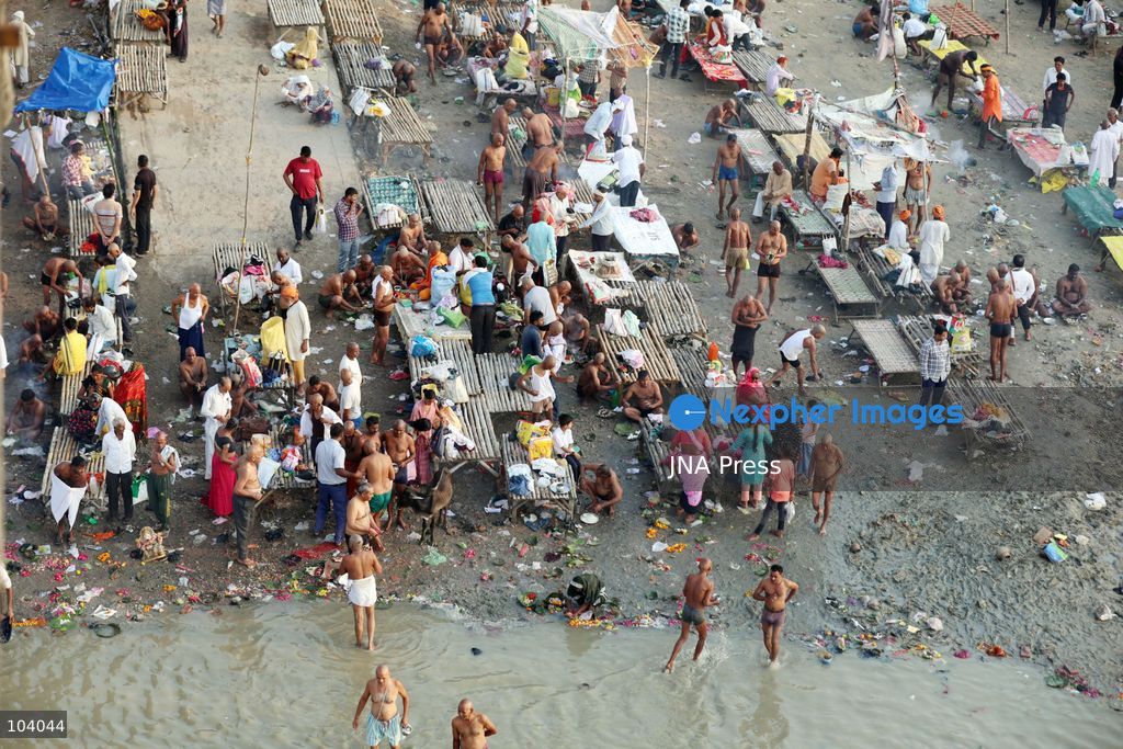 PRAYAGRAJ, INDIA, OCTOBER 11, 2026: Hindu devotees take a holy dip in the Ganga River at Phaphamau in Prayagraj, Uttar Pradesh, on the first day of the nine-day Navratri festival. The religious festival is dedicated to the worship of the Hindu goddess Durga and her nine forms, with devotees observing prayers, fasting and traditional rituals throughout the celebrations. Photo by Jitendra Prakash / JNA Press. (Photo by Jitendra Prakash/JNA Press via Nexpher Images)