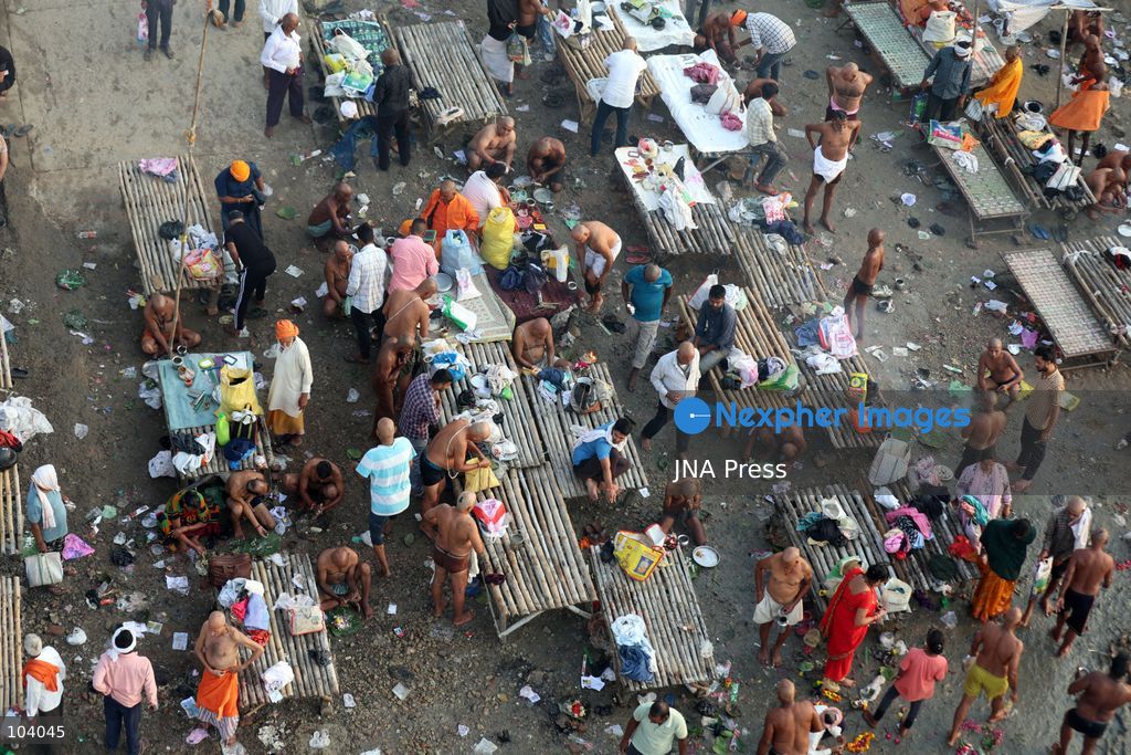 PRAYAGRAJ, INDIA, OCTOBER 11, 2026: Hindu devotees take a holy dip in the Ganga River at Phaphamau in Prayagraj, Uttar Pradesh, on the first day of the nine-day Navratri festival. The religious festival is dedicated to the worship of the Hindu goddess Durga and her nine forms, with devotees observing prayers, fasting and traditional rituals throughout the celebrations. Photo by Jitendra Prakash / JNA Press. (Photo by Jitendra Prakash/JNA Press via Nexpher Images)