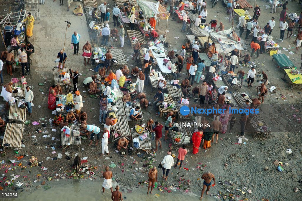 PRAYAGRAJ, INDIA, OCTOBER 11, 2026: Hindu devotees take a holy dip in the Ganga River at Phaphamau in Prayagraj, Uttar Pradesh, on the first day of the nine-day Navratri festival. The religious festival is dedicated to the worship of the Hindu goddess Durga and her nine forms, with devotees observing prayers, fasting and traditional rituals throughout the celebrations. Photo by Jitendra Prakash / JNA Press. (Photo by Jitendra Prakash/JNA Press via Nexpher Images)