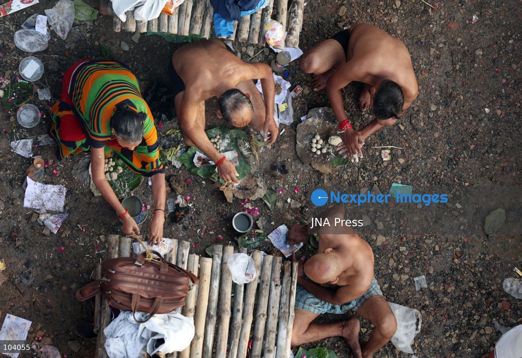 PRAYAGRAJ, INDIA, OCTOBER 11, 2026: Hindu devotees take a holy dip in the Ganga River at Phaphamau in Prayagraj, Uttar Pradesh, on the first day of the nine-day Navratri festival. The religious festival is dedicated to the worship of the Hindu goddess Durga and her nine forms, with devotees observing prayers, fasting and traditional rituals throughout the celebrations. Photo by Jitendra Prakash / JNA Press. (Photo by Jitendra Prakash/JNA Press via Nexpher Images)