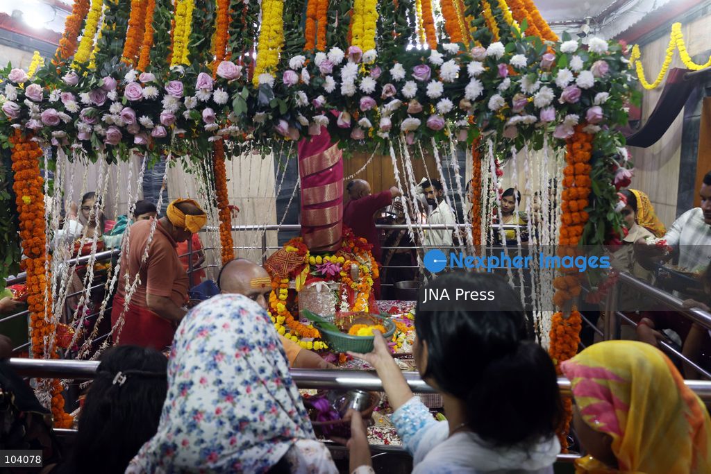 PRAYAGRAJ, INDIA, OCTOBER 11, 2026: Hindu devotees offer prayers to Goddess Alopshankari Devi at the Alopshankari Devi Temple in Prayagraj during celebrations for the nine-day Navratri festival. Worshippers gathered at the temple to perform puja and seek blessings during the Hindu festival dedicated to the worship of Goddess Durga and her manifestations. Photo by Jitendra Prakash / JNA Press. (Photo by Jitendra Prakash/JNA Press via Nexpher Images)