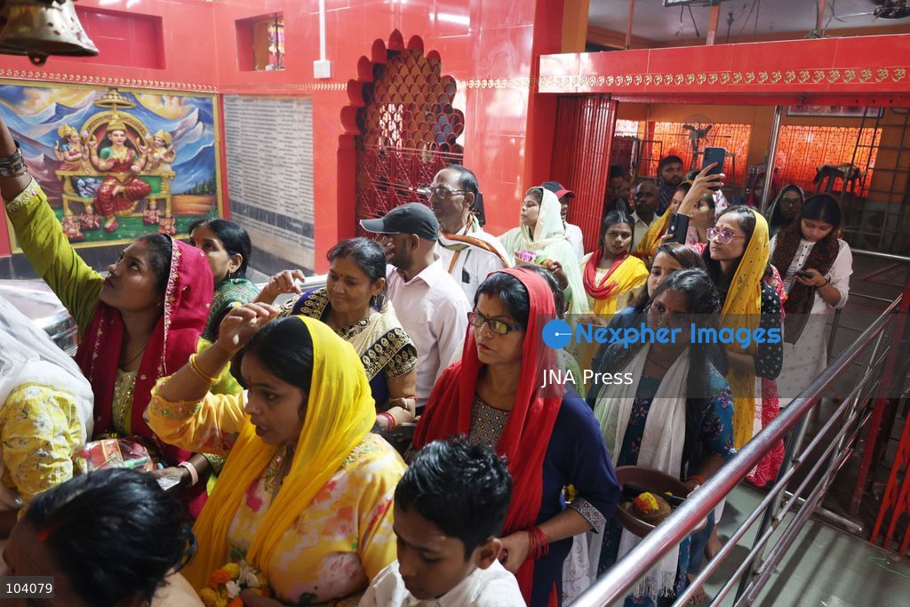 PRAYAGRAJ, INDIA, OCTOBER 11, 2026: Hindu devotees offer prayers to Goddess Alopshankari Devi at the Alopshankari Devi Temple in Prayagraj during celebrations for the nine-day Navratri festival. Worshippers gathered at the temple to perform puja and seek blessings during the Hindu festival dedicated to the worship of Goddess Durga and her manifestations. Photo by Jitendra Prakash / JNA Press. (Photo by Jitendra Prakash/JNA Press via Nexpher Images)