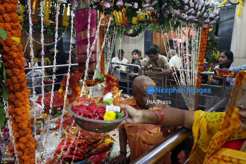 PRAYAGRAJ, INDIA, OCTOBER 11, 2026: Hindu devotees offer prayers to Goddess Alopshankari Devi at the Alopshankari Devi Temple in Prayagraj during celebrations for the nine-day Navratri festival. Worshippers gathered at the temple to perform puja and seek blessings during the Hindu festival dedicated to the worship of Goddess Durga and her manifestations. Photo by Jitendra Prakash / JNA Press. (Photo by Jitendra Prakash/JNA Press via Nexpher Images)