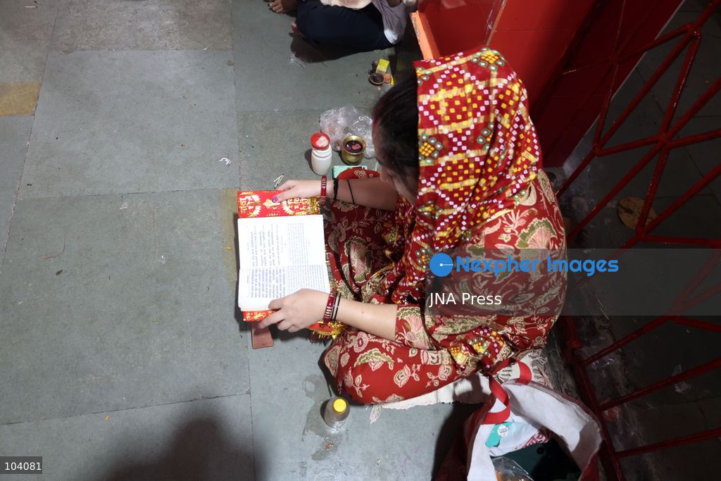 PRAYAGRAJ, INDIA, OCTOBER 11, 2026: Hindu devotees offer prayers to Goddess Alopshankari Devi at the Alopshankari Devi Temple in Prayagraj during celebrations for the nine-day Navratri festival. Worshippers gathered at the temple to perform puja and seek blessings during the Hindu festival dedicated to the worship of Goddess Durga and her manifestations. Photo by Jitendra Prakash / JNA Press. (Photo by Jitendra Prakash/JNA Press via Nexpher Images)