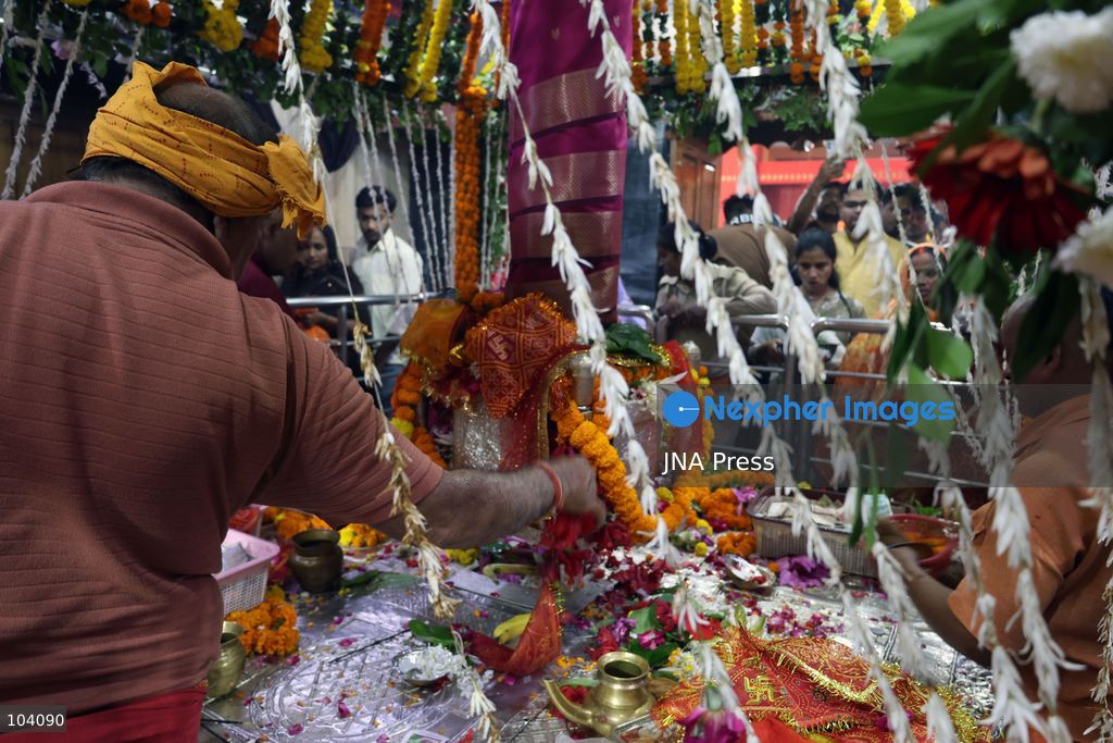 PRAYAGRAJ, INDIA, OCTOBER 11, 2026: Hindu devotees offer prayers to Goddess Alopshankari Devi at the Alopshankari Devi Temple in Prayagraj during celebrations for the nine-day Navratri festival. Worshippers gathered at the temple to perform puja and seek blessings during the Hindu festival dedicated to the worship of Goddess Durga and her manifestations. Photo by Jitendra Prakash / JNA Press. (Photo by Jitendra Prakash/JNA Press via Nexpher Images)