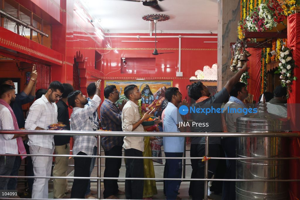 PRAYAGRAJ, INDIA, OCTOBER 11, 2026: Hindu devotees offer prayers to Goddess Alopshankari Devi at the Alopshankari Devi Temple in Prayagraj during celebrations for the nine-day Navratri festival. Worshippers gathered at the temple to perform puja and seek blessings during the Hindu festival dedicated to the worship of Goddess Durga and her manifestations. Photo by Jitendra Prakash / JNA Press. (Photo by Jitendra Prakash/JNA Press via Nexpher Images)