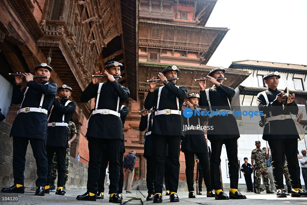 KATHMANDU, NEPAL, OCTOBER 11, 2026: A Hindu priest and Nepal Army personnel sow Jamara seeds during a Ghatasthapana ceremony marking the beginning of Dashain, Nepal's biggest Hindu festival, in Kathmandu. During the traditional ritual, barley and other grains are planted and kept away from sunlight to produce yellow shoots known as Jamara, which are later offered with tika as blessings during Bijaya Dashami. The 15-day Dashain festival began across Nepal as communities in Gorkha district faced disruption following severe flash flooding. Photo by Safal Prakash Shrestha / JNA Press. (Photo by Safal Prakash Shrestha/JNA Press via Nexpher Images)