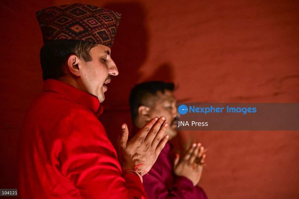 KATHMANDU, NEPAL, OCTOBER 11, 2026: A Hindu priest and Nepal Army personnel sow Jamara seeds during a Ghatasthapana ceremony marking the beginning of Dashain, Nepal's biggest Hindu festival, in Kathmandu. During the traditional ritual, barley and other grains are planted and kept away from sunlight to produce yellow shoots known as Jamara, which are later offered with tika as blessings during Bijaya Dashami. The 15-day Dashain festival began across Nepal as communities in Gorkha district faced disruption following severe flash flooding. Photo by Safal Prakash Shrestha / JNA Press. (Photo by Safal Prakash Shrestha/JNA Press via Nexpher Images)