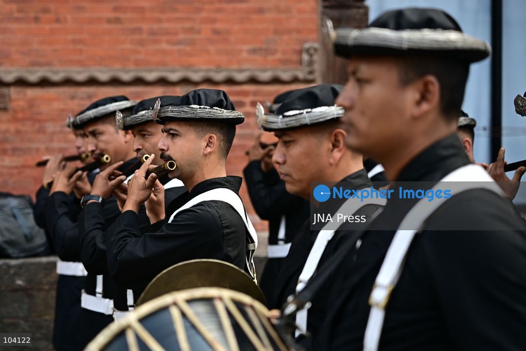 KATHMANDU, NEPAL, OCTOBER 11, 2026: A Hindu priest and Nepal Army personnel sow Jamara seeds during a Ghatasthapana ceremony marking the beginning of Dashain, Nepal's biggest Hindu festival, in Kathmandu. During the traditional ritual, barley and other grains are planted and kept away from sunlight to produce yellow shoots known as Jamara, which are later offered with tika as blessings during Bijaya Dashami. The 15-day Dashain festival began across Nepal as communities in Gorkha district faced disruption following severe flash flooding. Photo by Safal Prakash Shrestha / JNA Press. (Photo by Safal Prakash Shrestha/JNA Press via Nexpher Images)