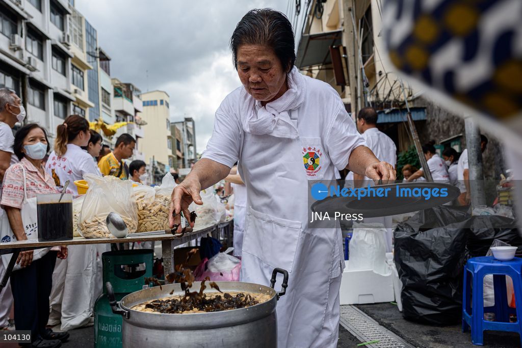 BANGKOK, THAILAND, OCTOBER 11, 2026: Devotees and performers take part in the annual deity procession organized by the Tiger God Shrine in Bangkok. The celebration features Chinese religious traditions including a procession of deities, Yingge performances, lion dances and dragon dances, as worshippers gather to pay respects and seek blessings. According to the shrine's tradition, the annual observance commemorates the day Tua Lao Eia Kong attained spiritual enlightenment. Photo by Watsawat Koktabtim / JNA Press. (Photo by Watsawat "James" Koktabtim/JNA Press via Nexpher Images)