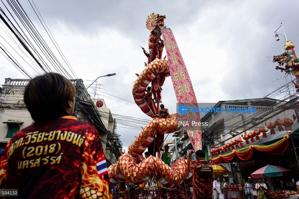 BANGKOK, THAILAND, OCTOBER 11, 2026: Devotees and performers take part in the annual deity procession organized by the Tiger God Shrine in Bangkok. The celebration features Chinese religious traditions including a procession of deities, Yingge performances, lion dances and dragon dances, as worshippers gather to pay respects and seek blessings. According to the shrine's tradition, the annual observance commemorates the day Tua Lao Eia Kong attained spiritual enlightenment. Photo by Watsawat Koktabtim / JNA Press. (Photo by Watsawat "James" Koktabtim/JNA Press via Nexpher Images)