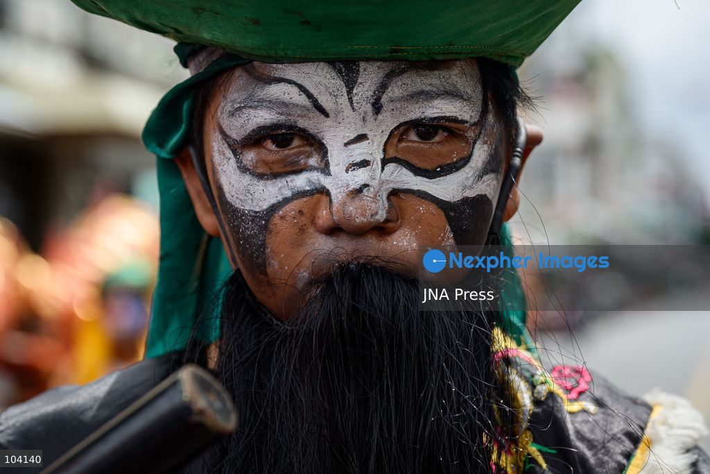 BANGKOK, THAILAND, OCTOBER 11, 2026: Devotees and performers take part in the annual deity procession organized by the Tiger God Shrine in Bangkok. The celebration features Chinese religious traditions including a procession of deities, Yingge performances, lion dances and dragon dances, as worshippers gather to pay respects and seek blessings. According to the shrine's tradition, the annual observance commemorates the day Tua Lao Eia Kong attained spiritual enlightenment. Photo by Watsawat Koktabtim / JNA Press. (Photo by Watsawat "James" Koktabtim/JNA Press via Nexpher Images)