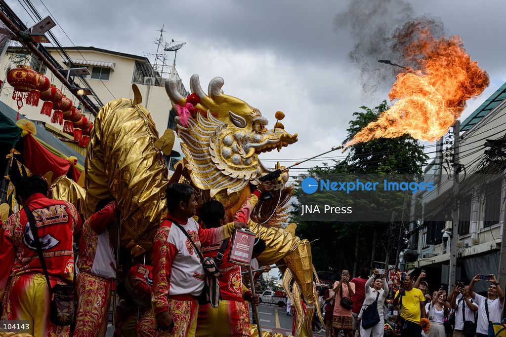 BANGKOK, THAILAND, OCTOBER 11, 2026: Devotees and performers take part in the annual deity procession organized by the Tiger God Shrine in Bangkok. The celebration features Chinese religious traditions including a procession of deities, Yingge performances, lion dances and dragon dances, as worshippers gather to pay respects and seek blessings. According to the shrine's tradition, the annual observance commemorates the day Tua Lao Eia Kong attained spiritual enlightenment. Photo by Watsawat Koktabtim / JNA Press. (Photo by Watsawat "James" Koktabtim/JNA Press via Nexpher Images)